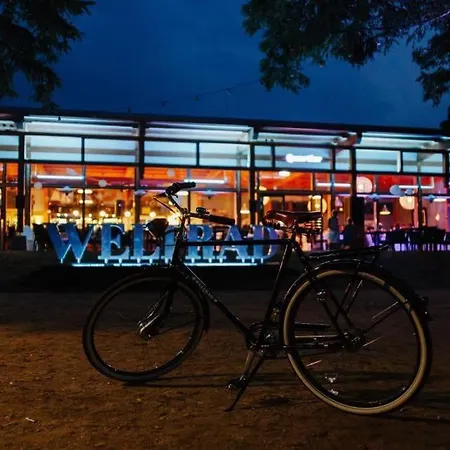 Weltrad Am Fluss Restaurant & Quartier