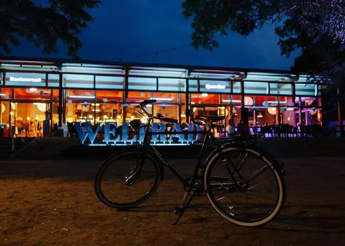 Weltrad Am Fluss Restaurant & Quartier